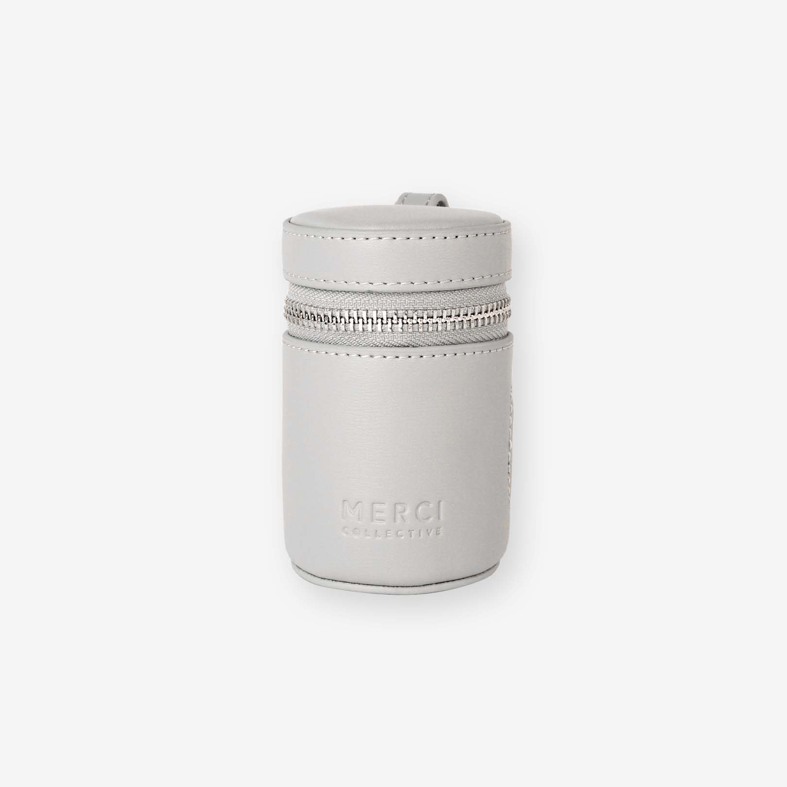 Just Did It poop bag holder featuring a stylish design, side slit for easy bag access, and a carabiner for secure attachment.