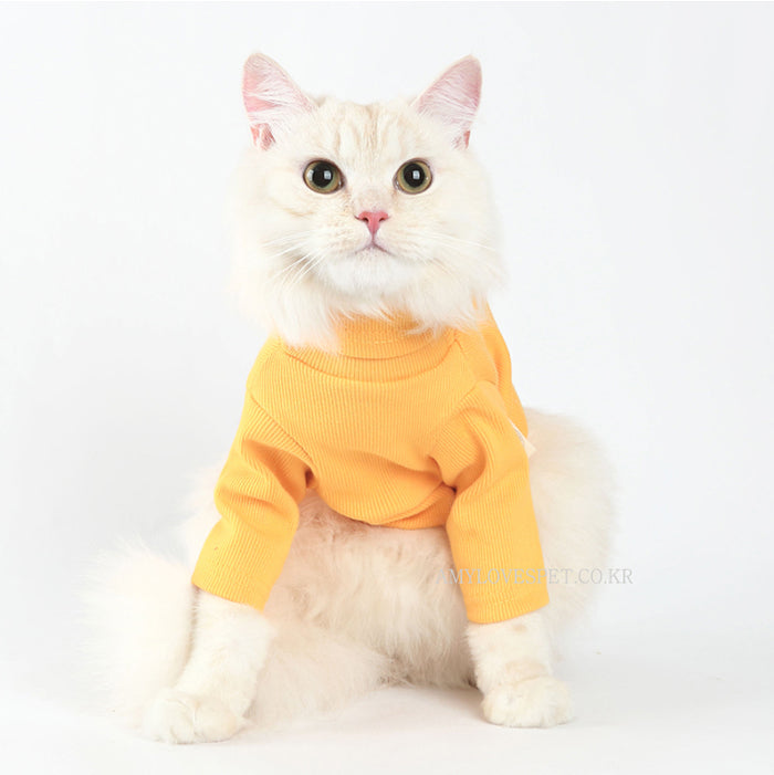 A stylish yellow turtleneck for pets, made of soft cotton, perfect for daily wear.
