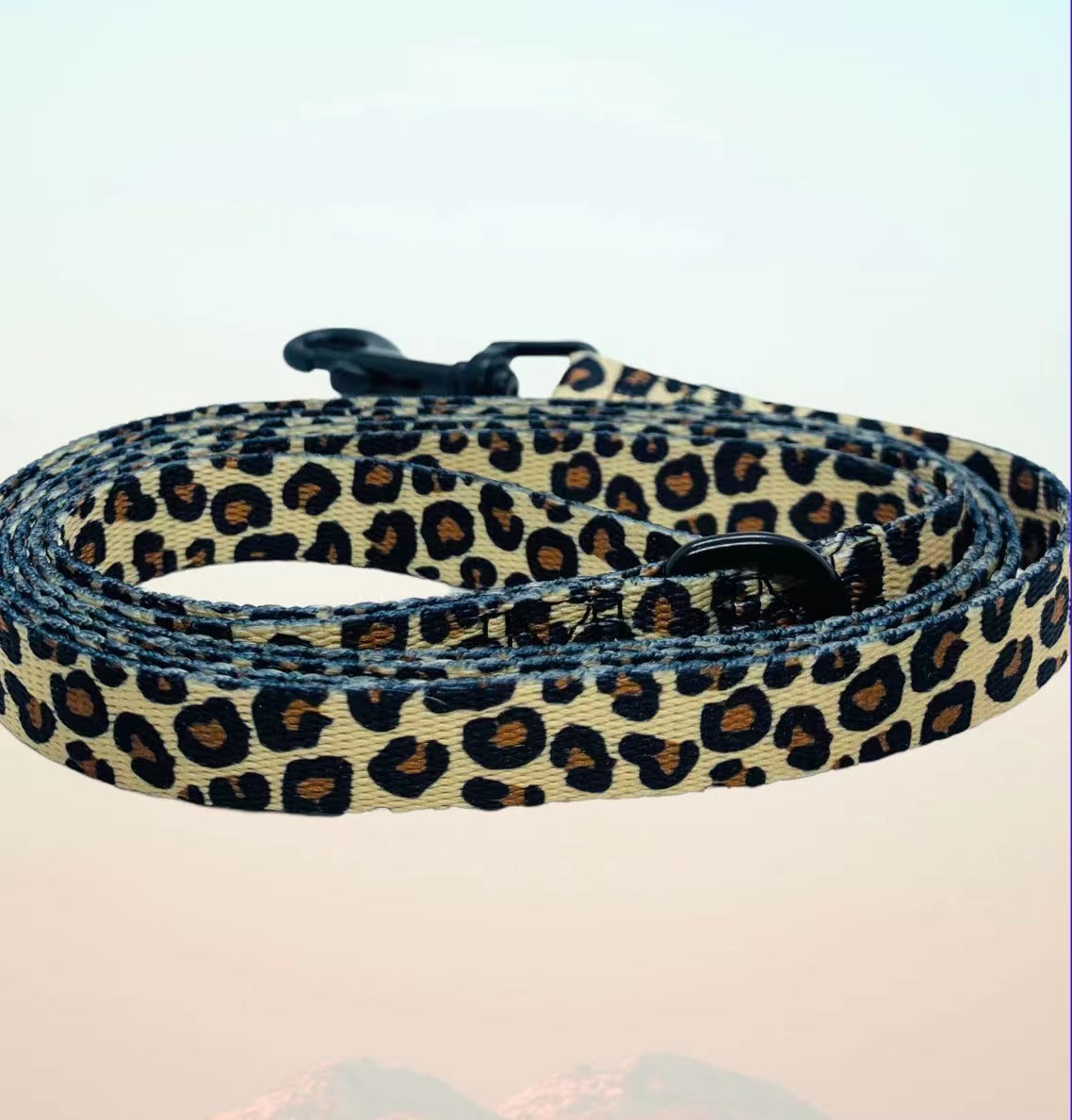 Stylish LEASH - LEOPARD featuring a trendy leopard print design, made from durable nylon material for comfortable dog walks.