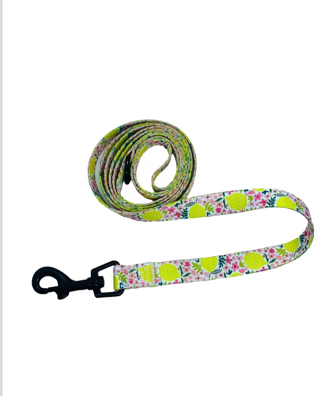 A vibrant dog leash featuring a playful lemon print design, made from durable nylon material, perfect for stylish dog walks.