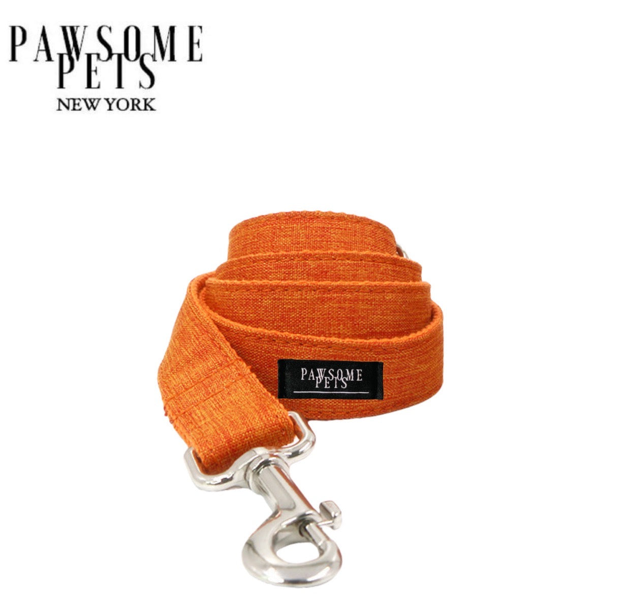 Stylish orange dog leash featuring rose gold hardware and sturdy D-Ring for accessories, designed for comfort and durability.