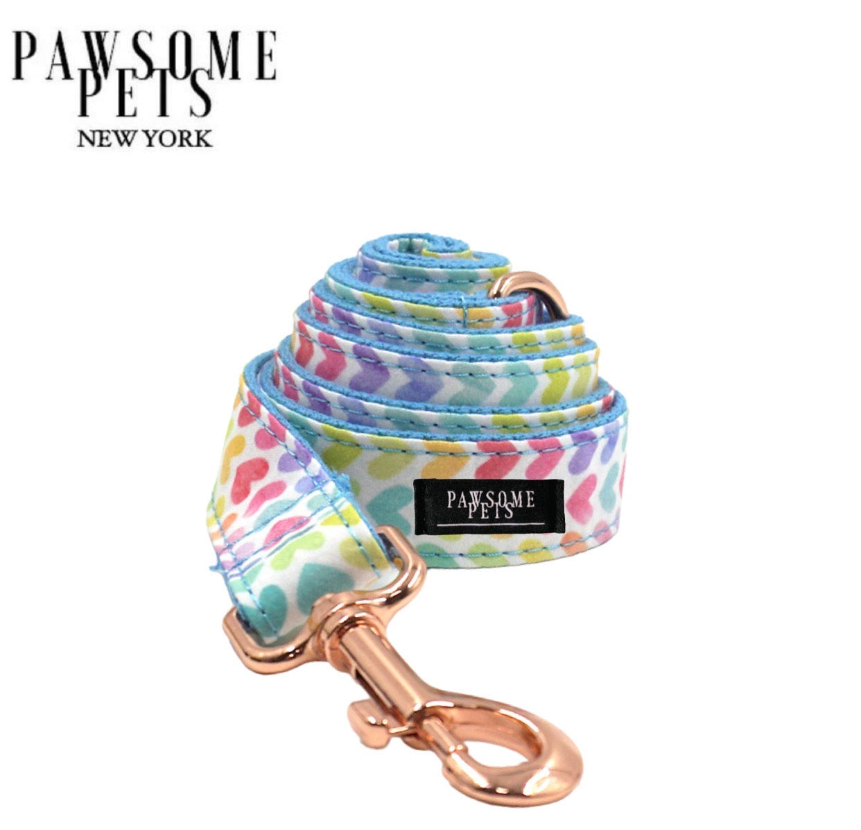 A vibrant blue leash featuring a rainbow design, equipped with rose gold hardware and a sturdy D-Ring for accessories.