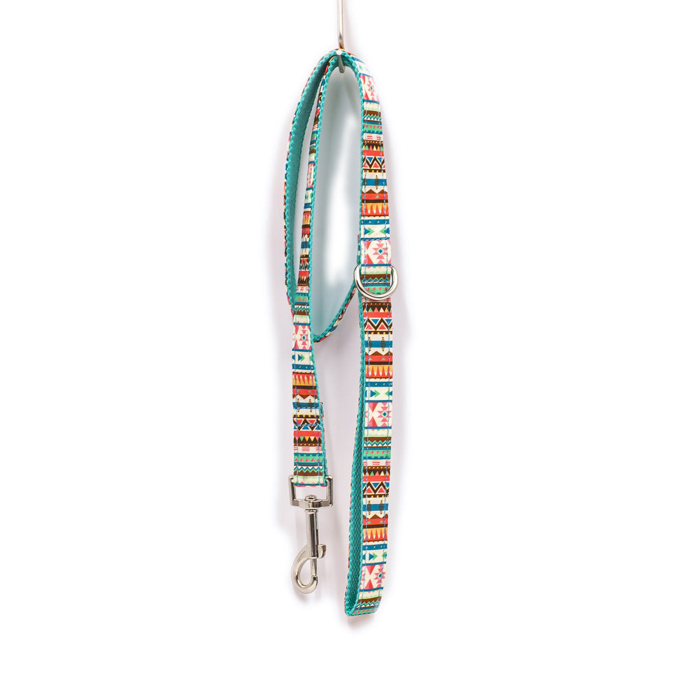 A vibrant tropical-themed dog leash featuring heavy-duty silver hardware and reinforced nylon strapping, perfect for stylish walks.