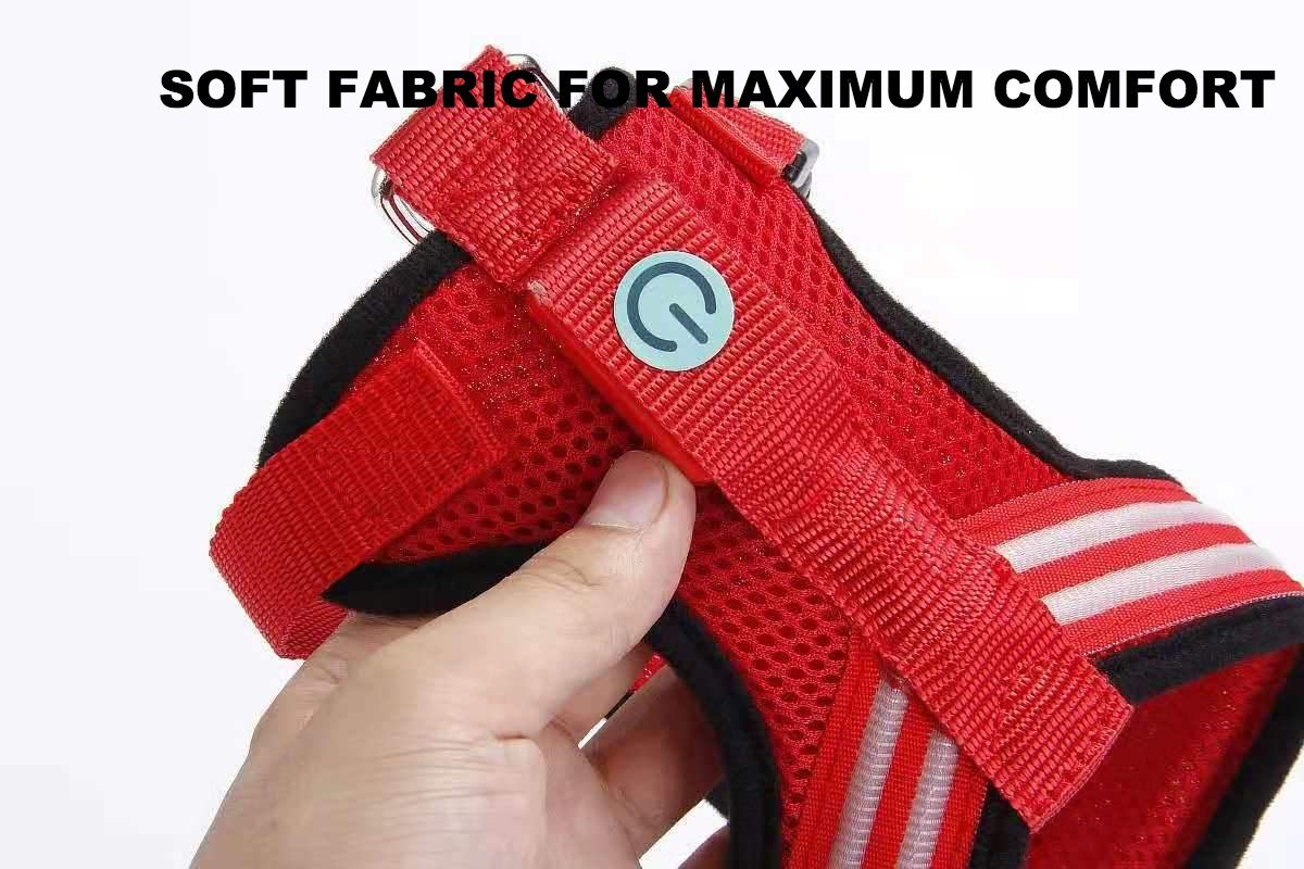 A brightly colored LED dog harness featuring optic fiber lights, adjustable straps, and a durable design, perfect for nighttime visibility.