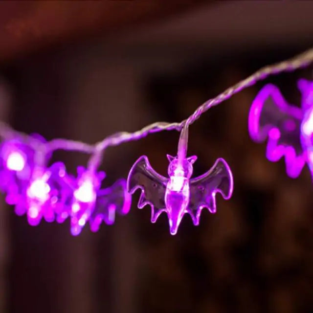 Colorful LED Halloween Light String featuring pumpkins, bats, and skulls, perfect for festive decorations.