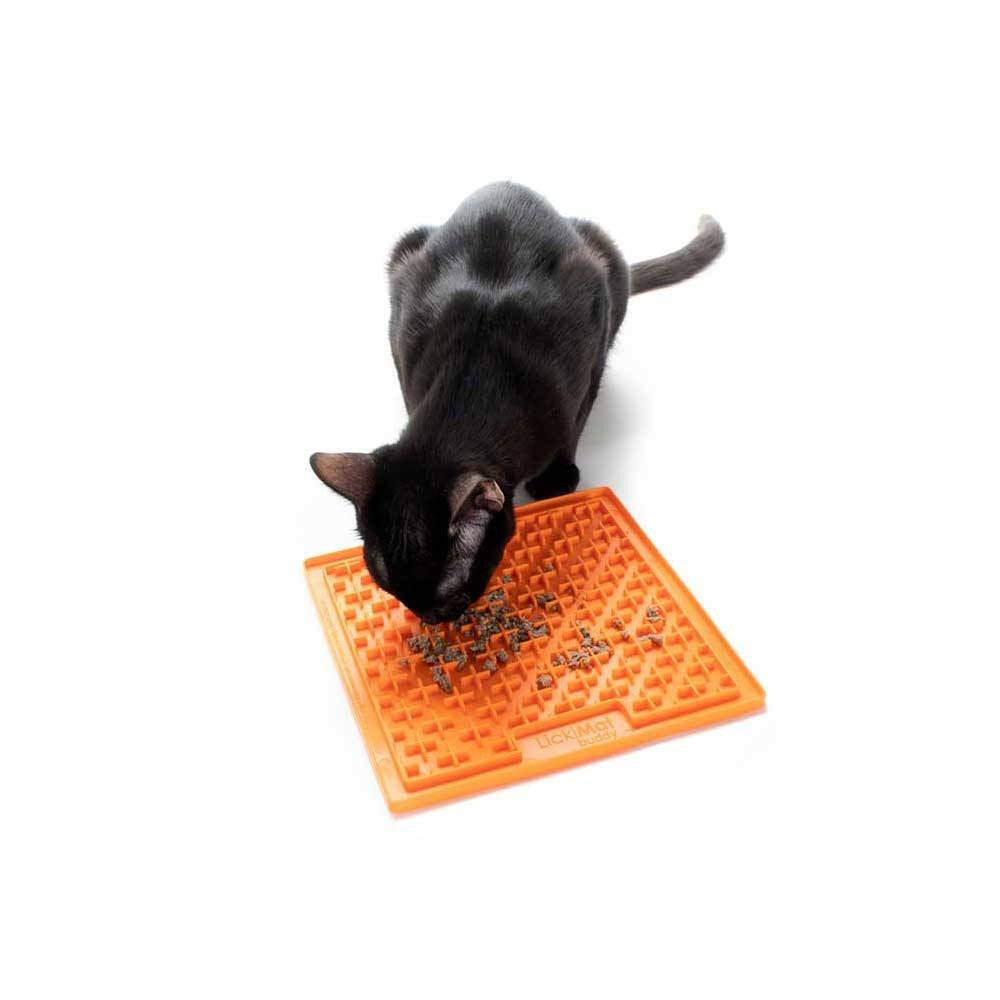 Lickimat Soother Treat Mat for dogs and cats, featuring a raised bumpy design ideal for runny treats like yogurt and gravy, in vibrant colors.