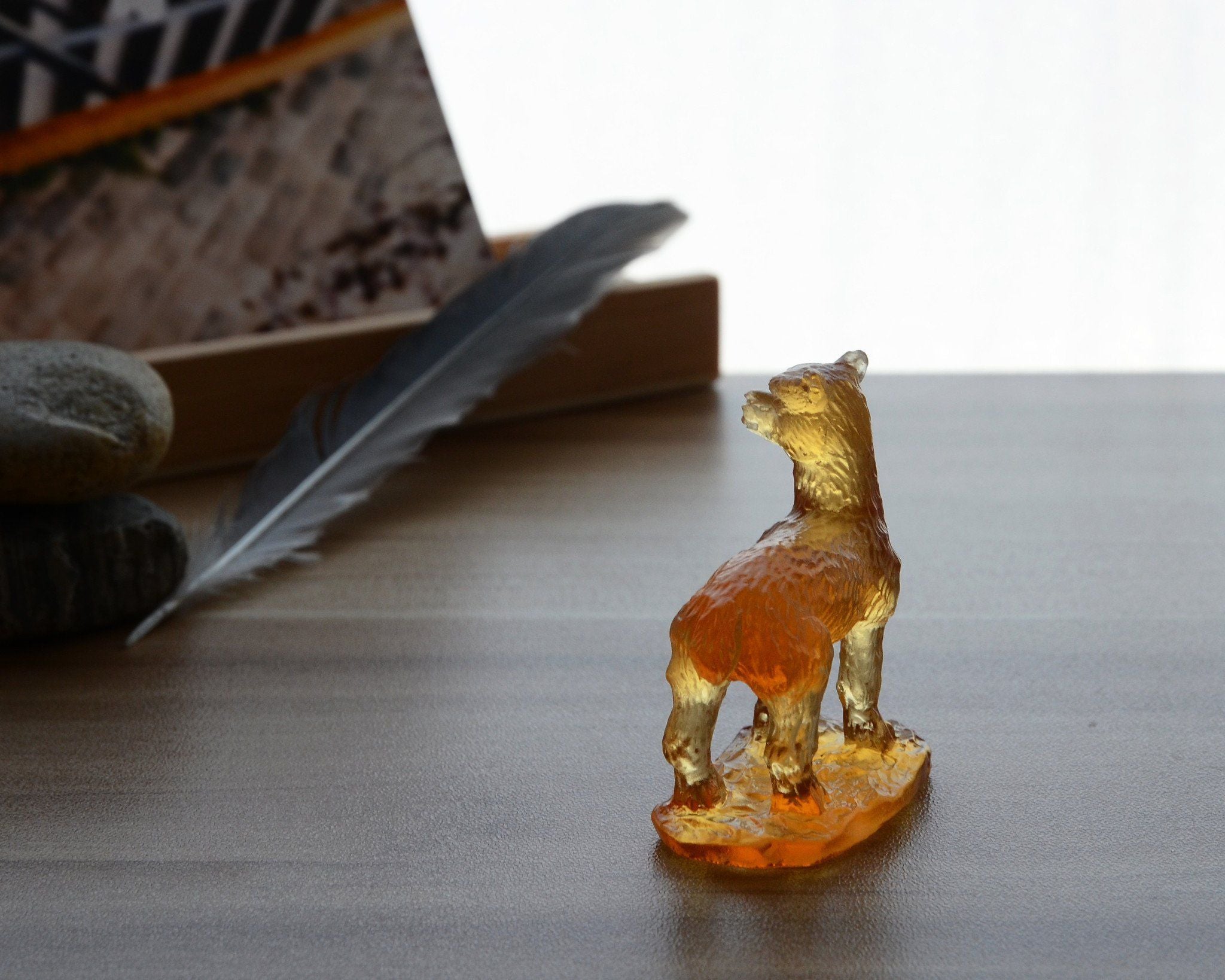 A beautifully crafted Liuli Crystal Alpaca Figurine showcasing intricate details and vibrant colors, perfect for home decor.