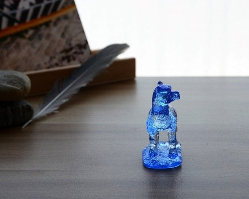 A beautifully crafted Liuli Crystal Alpaca Figurine showcasing intricate details and vibrant colors, perfect for home decor.