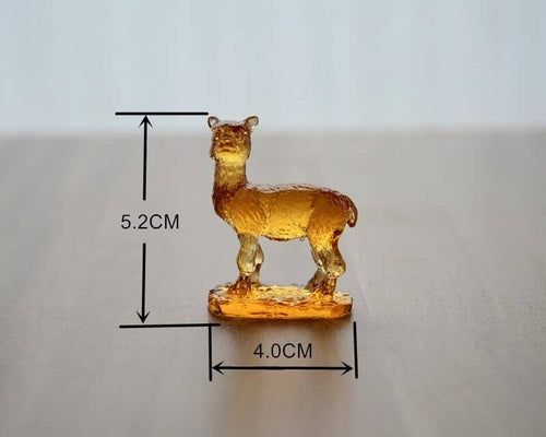 A beautifully crafted Liuli Crystal Alpaca Figurine showcasing intricate details and vibrant colors, perfect for home decor.