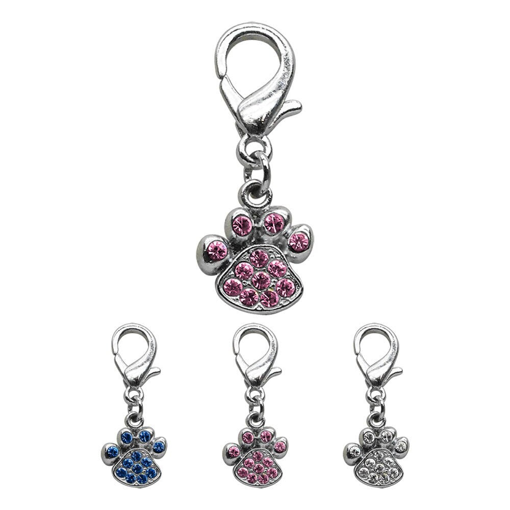 A sparkling lobster claw paw charm with rhinestones, designed for pet collars, showcasing its stylish and elegant appearance.