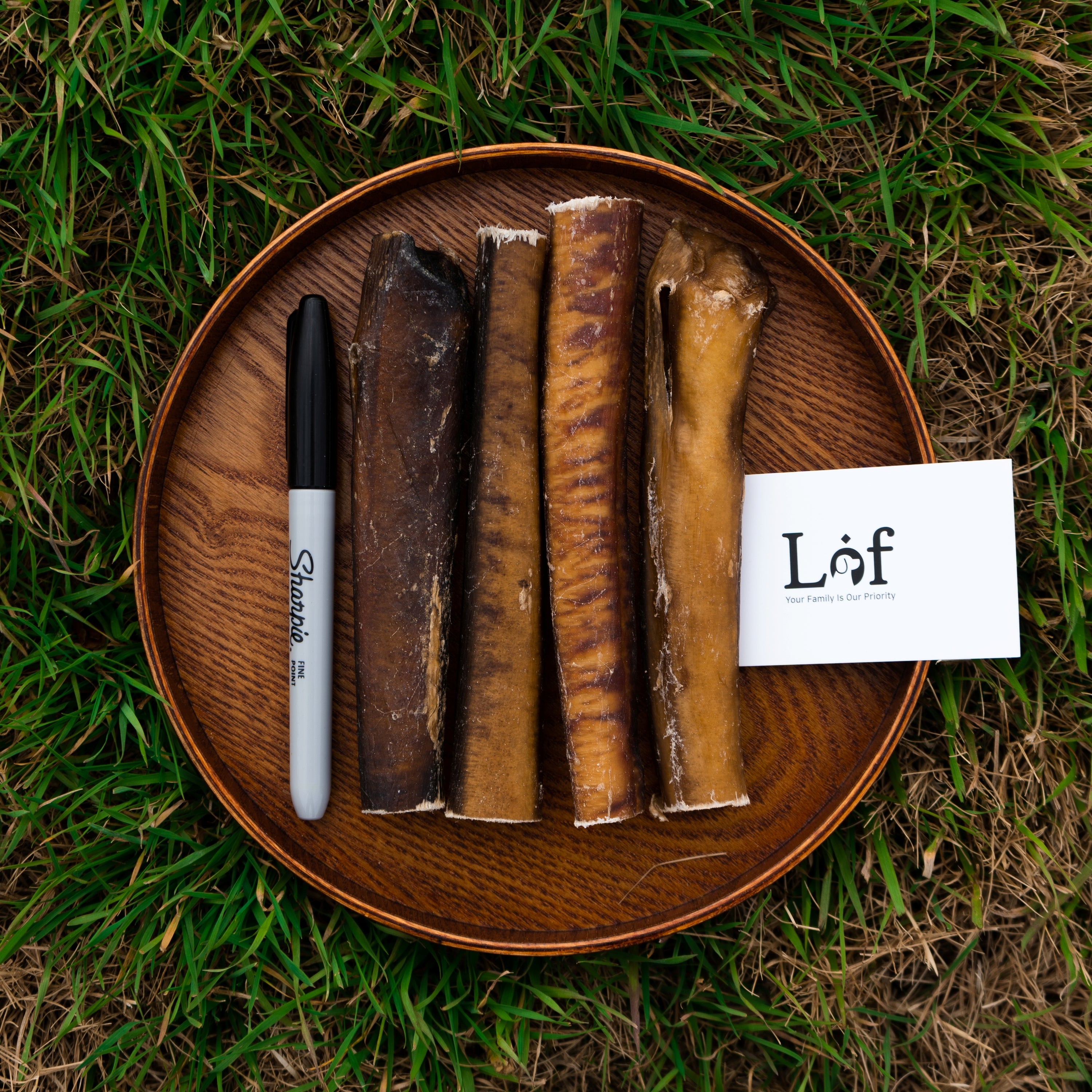 Lof Premium Odor-Free 6 Inch Monster Bully Sticks made from 100% beef pizzle, showcasing their natural texture and quality.