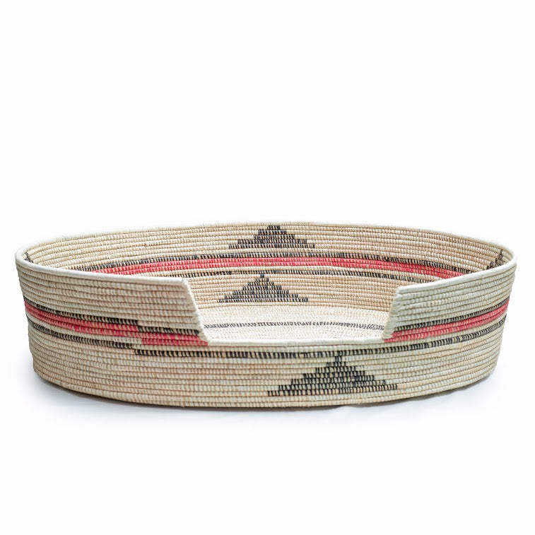 Mawenzi Handwoven Dog Bed showcasing vibrant colors and intricate patterns, handmade by skilled artisans using natural materials.