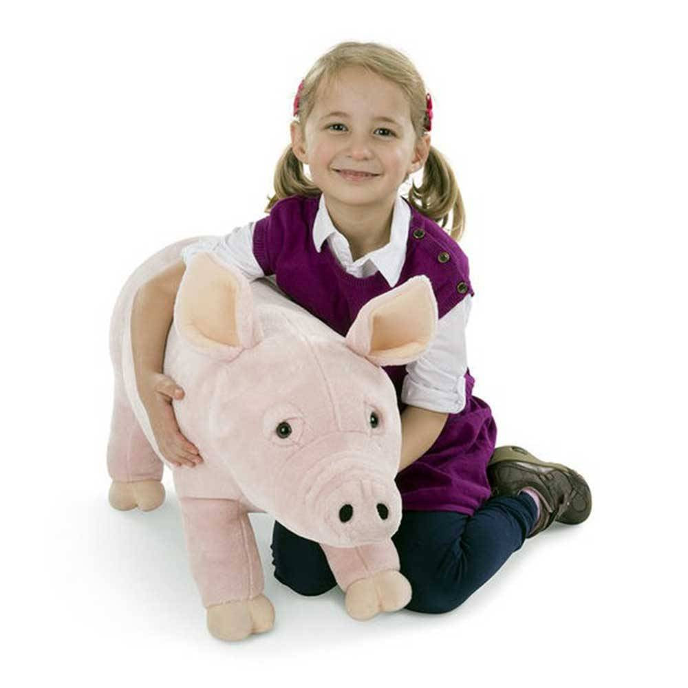 Melissa & Doug Lifelike Pig Stuffed Animal Toy with floppy ears and a corkscrew tail, designed for kids' play and home decor.