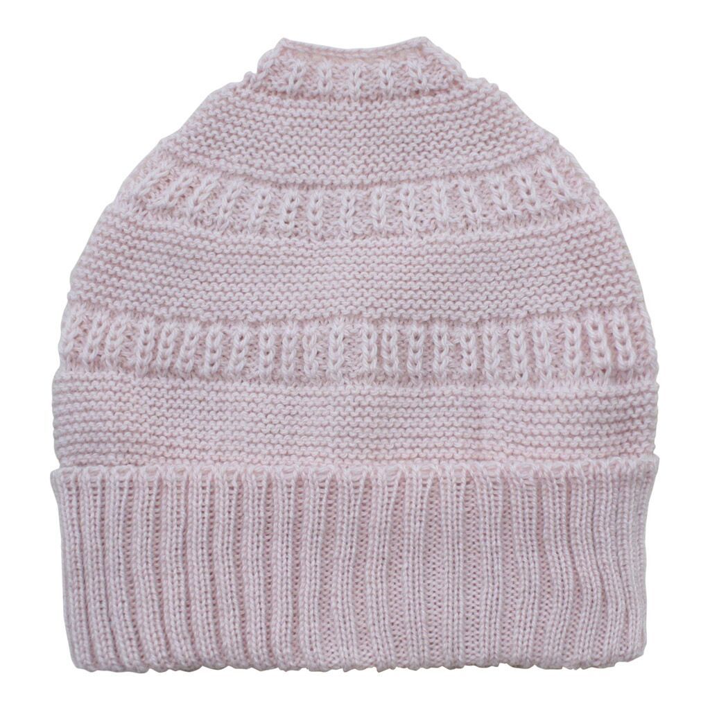 A cozy Messy Bun Alpaca Hat showcasing a stylish design with a ponytail hole, made from a soft alpaca blend, perfect for cool weather.