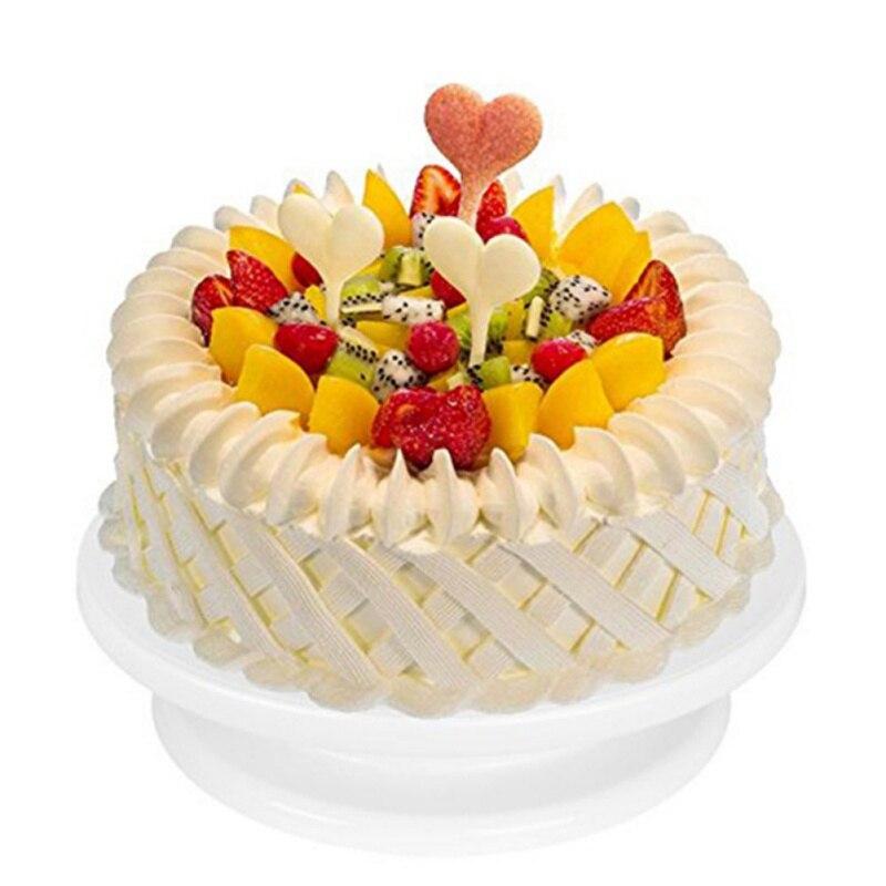 A Non-slip Cake Turntable featuring a lace design, ideal for cake decorating and DIY baking projects, made from eco-friendly plastic.