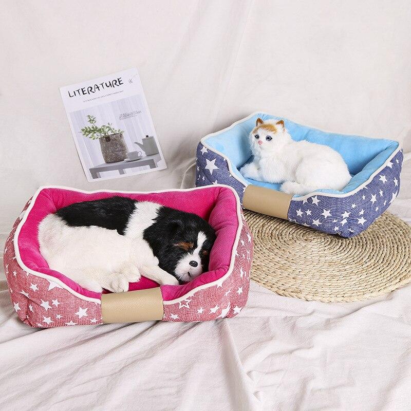 Non-slip pet dog bed in blue and pink, designed for comfort and warmth, suitable for dogs and cats.