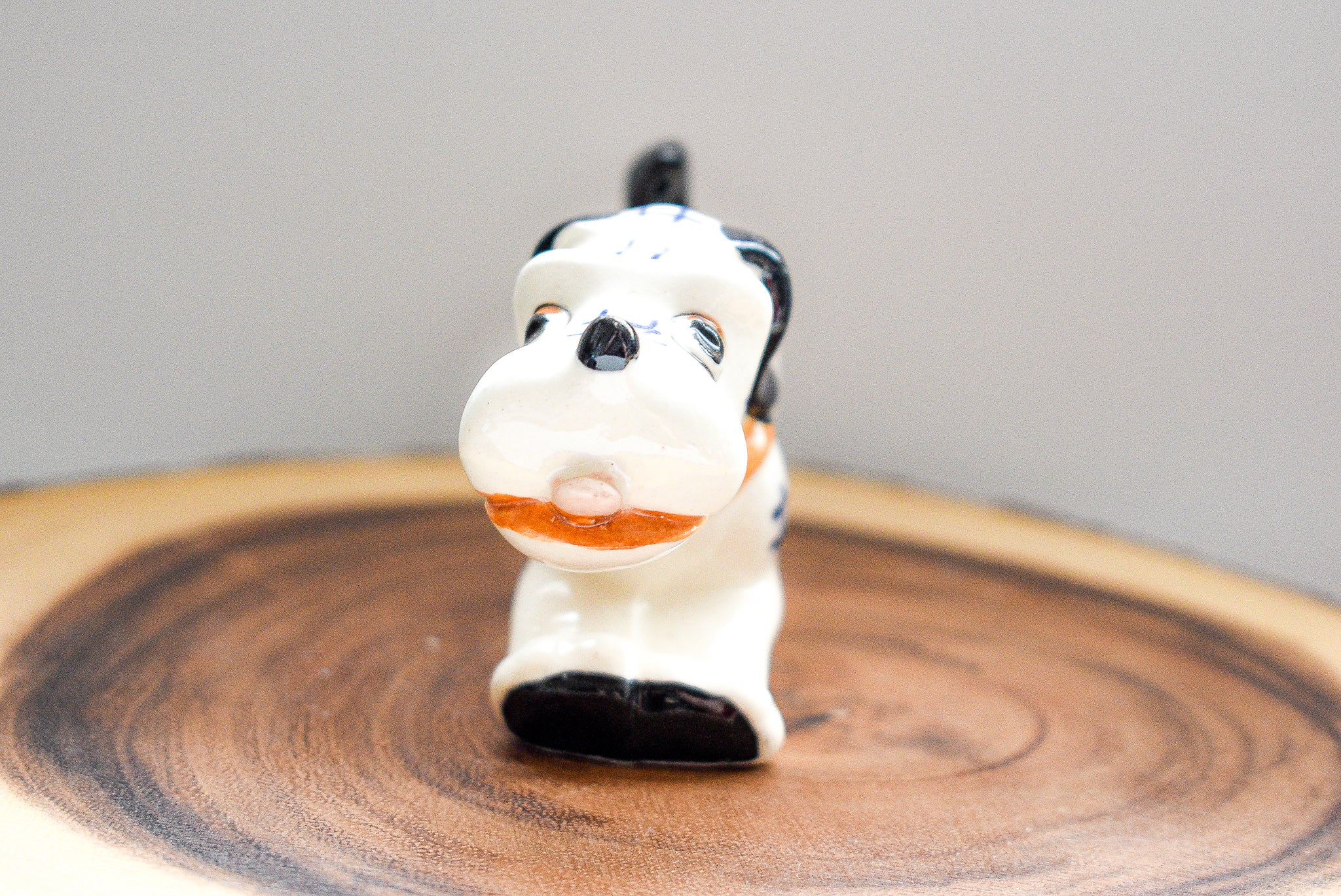 Occupied Japan Dachshund figurine, ceramic, 2.5 inches tall, 4.5 inches long, vintage collectible with light paint wear.