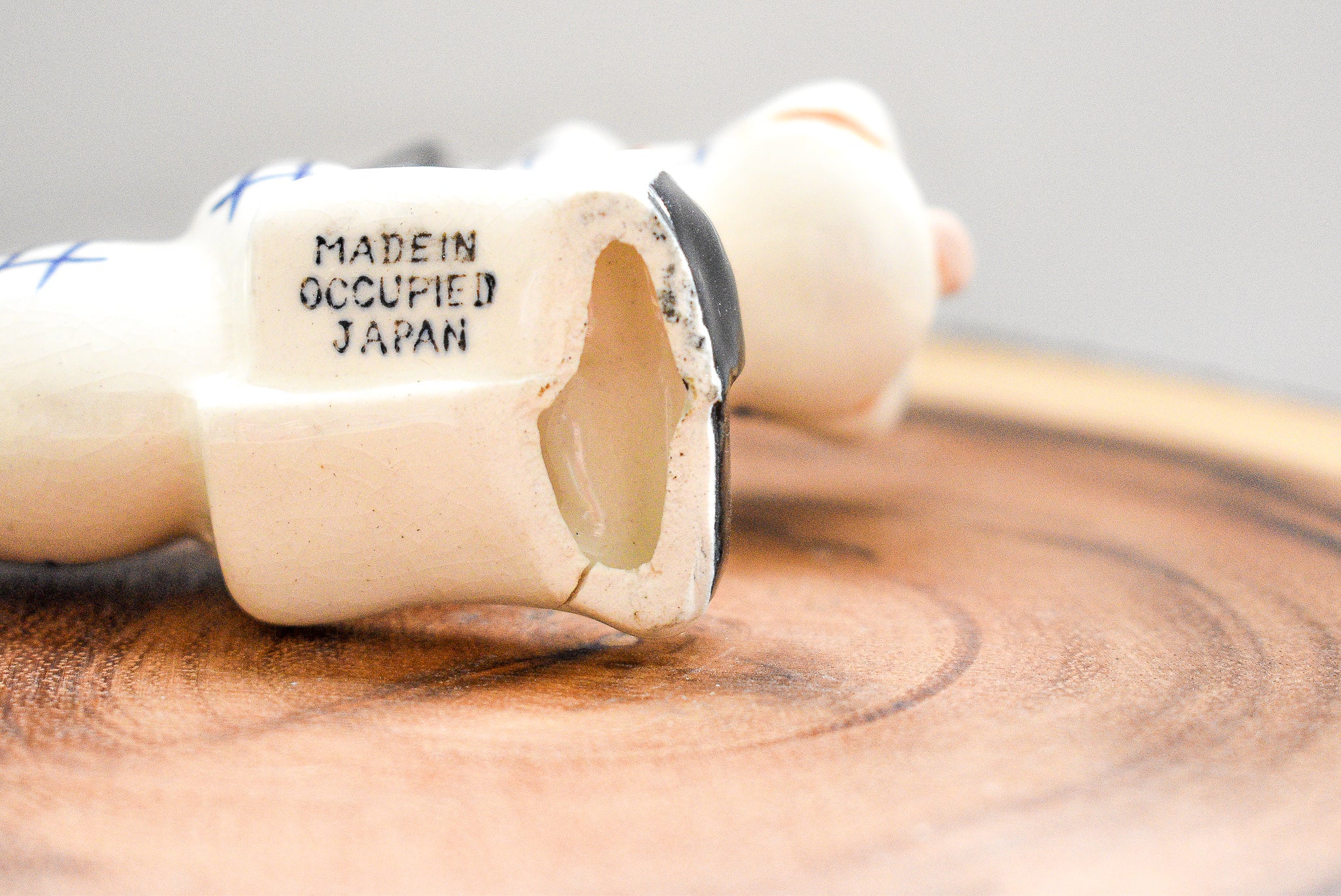 Occupied Japan Dachshund figurine, ceramic, 2.5 inches tall, 4.5 inches long, vintage collectible with light paint wear.