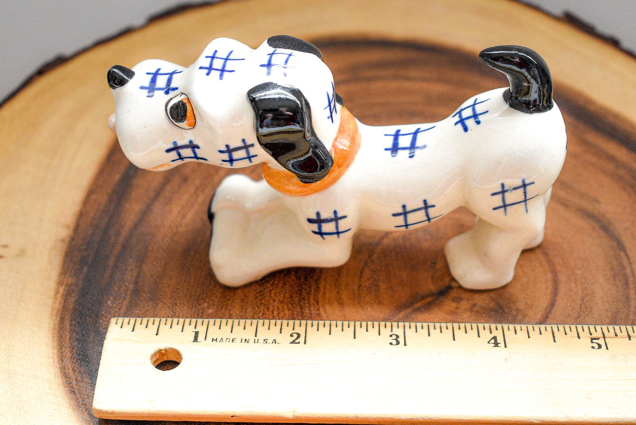 Occupied Japan Dachshund figurine, ceramic, 2.5 inches tall, 4.5 inches long, vintage collectible with light paint wear.