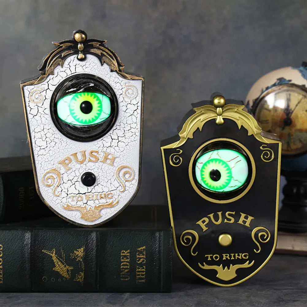 One-Eyed Glowing Halloween Doorbell Prop with eerie glow and spooky design, perfect for Halloween decorations.