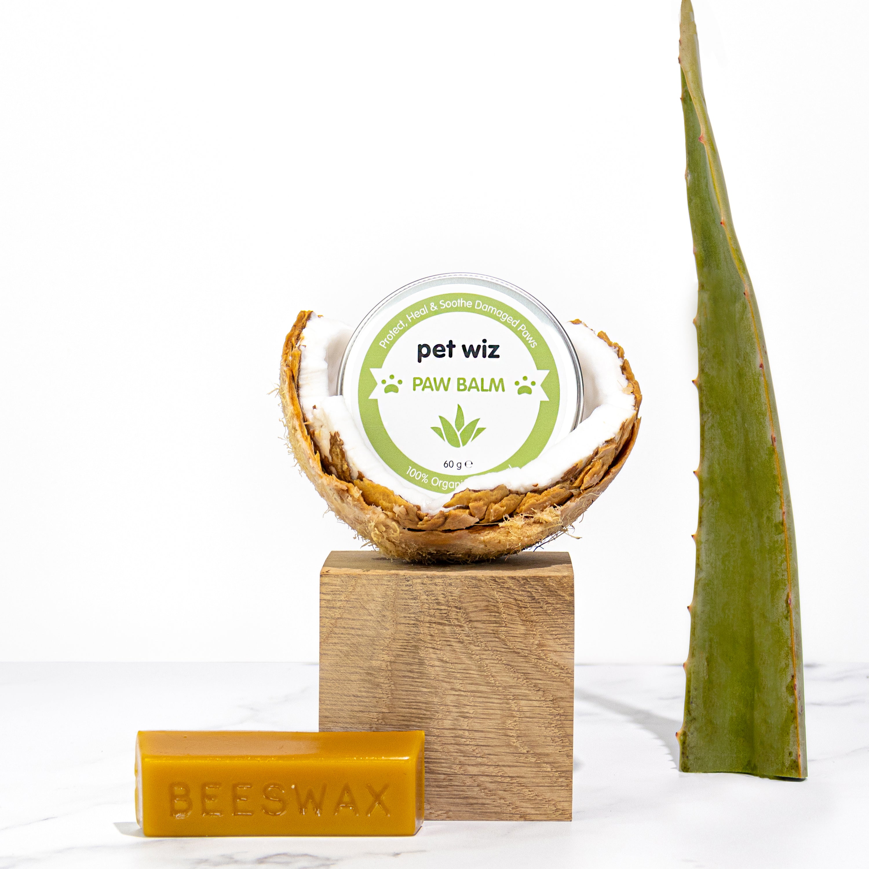 A jar of Organic Paw and Nose Balm for Dogs and Cats, showcasing its natural ingredients and soothing properties for pet care.