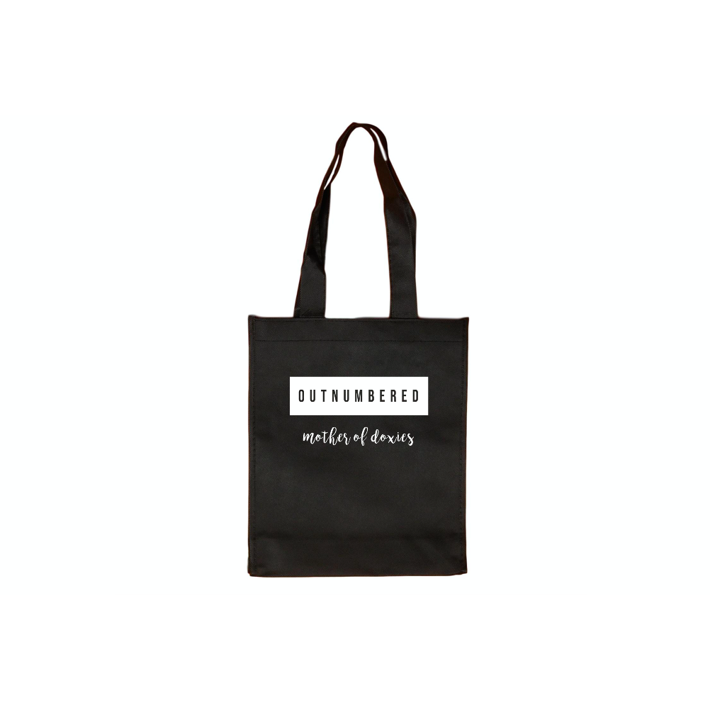 Outnumbered Doxies tote bag made of 100% cotton, featuring a unique screen-printed design, perfect for dog lovers.