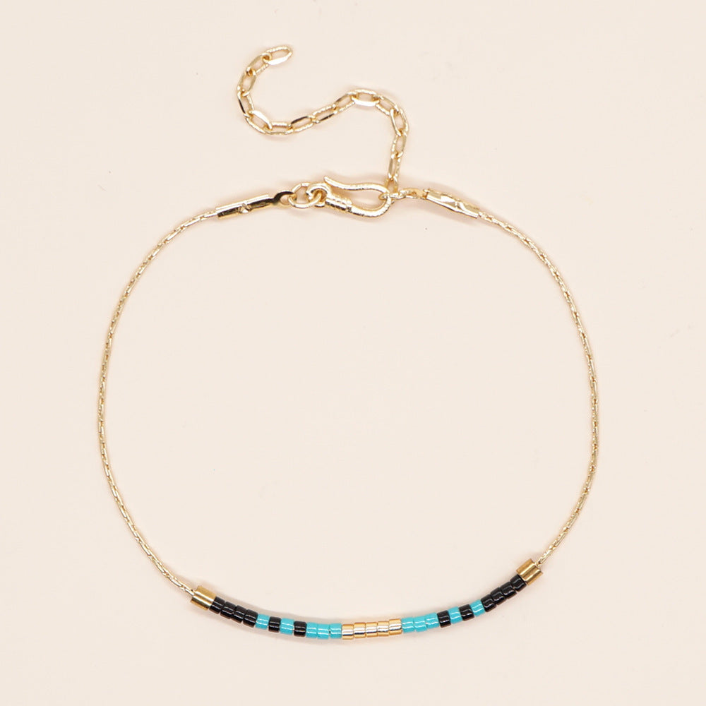 PAWSOME BRACELETS - #2 featuring a minimalist design in brass with 18k gold plating, showcasing a lobster claw closure.