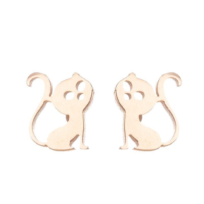 A pair of Pawsome Earrings featuring gold-filled and sterling silver materials in an elegant art deco design.