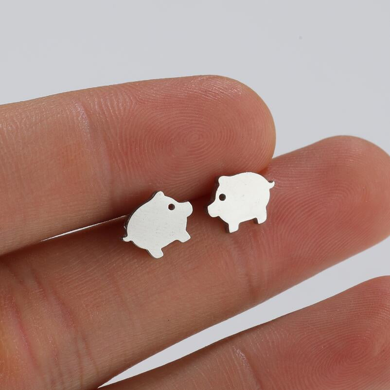 Pawsome Earrings - handmade art deco earrings made from gold filled, sterling silver, and stainless steel, featuring a secure ear wire closure.