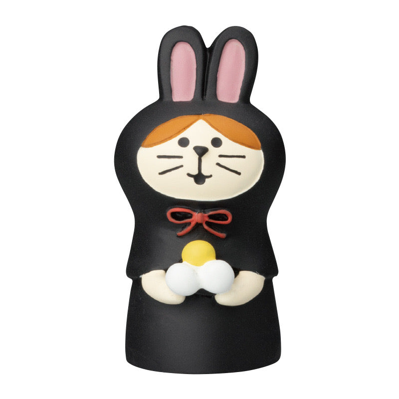 A colorful collection of Pawsome figurines made from polymer clay, showcasing various styles and designs suitable for home decor and gifting.