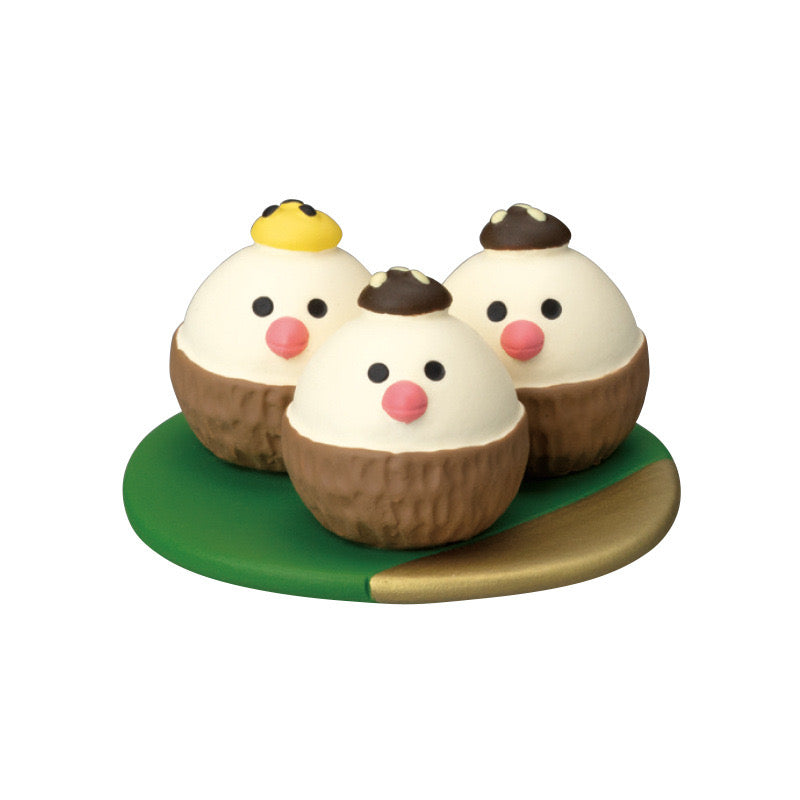 Colorful Pawsome figurines made of polymer clay, showcasing various designs and styles, perfect for home or office decoration.