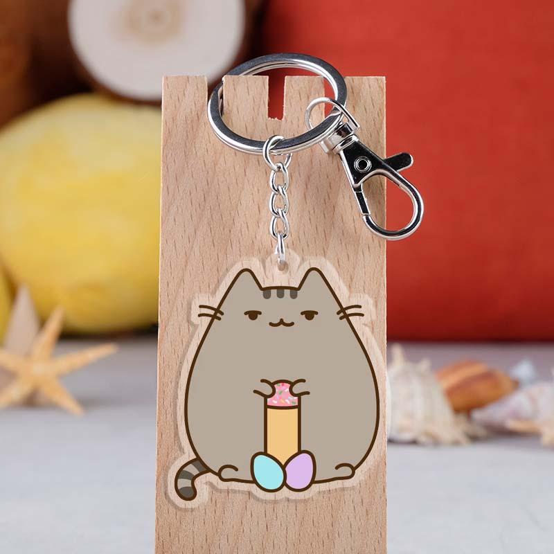 A colorful Pawsome Keychain featuring adorable pet designs, durable and waterproof.