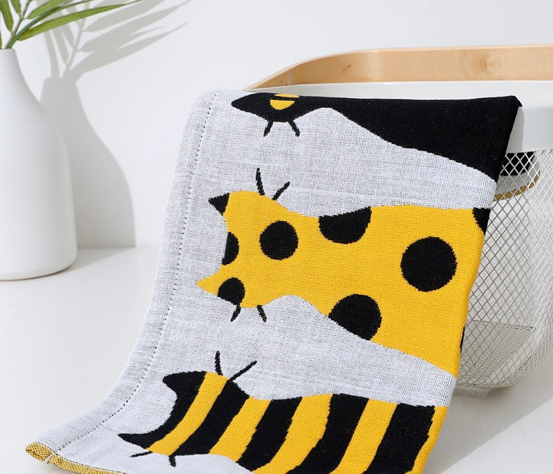 Pawsome Kitchen Towel featuring a vibrant floral design, made of 100% cotton, ideal for kitchen use.