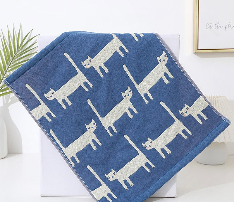 A vibrant PAWSOME KITCHEN TOWEL featuring a colorful floral design, made from 100% cotton, perfect for drying hands and dishes.