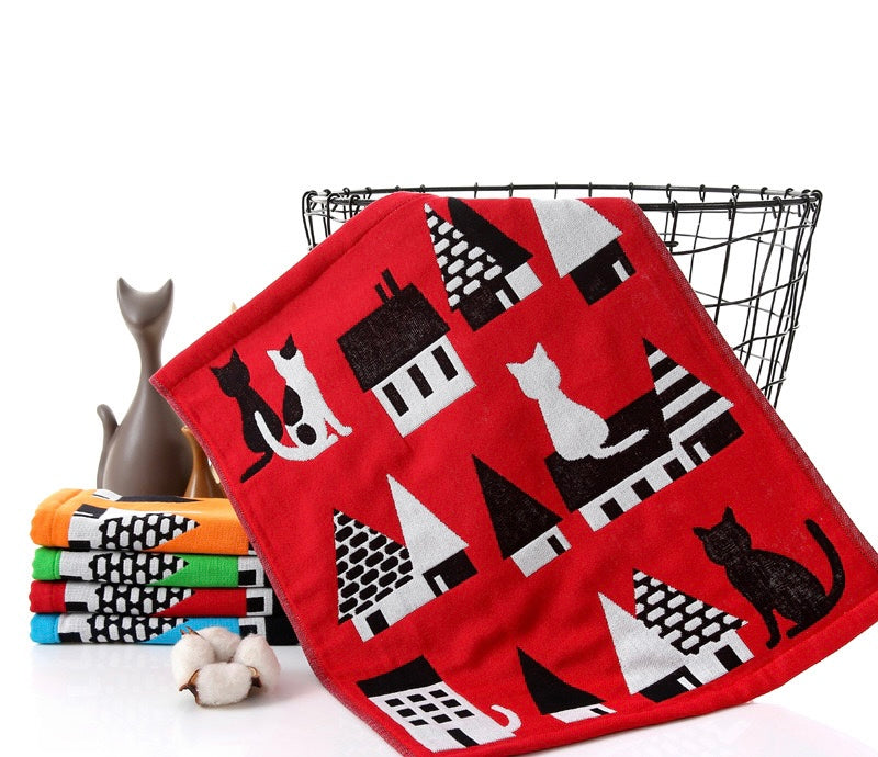 A colorful PAWSOME KITCHEN TOWEL featuring a vibrant floral design, made of 100% cotton, perfect for kitchen use.