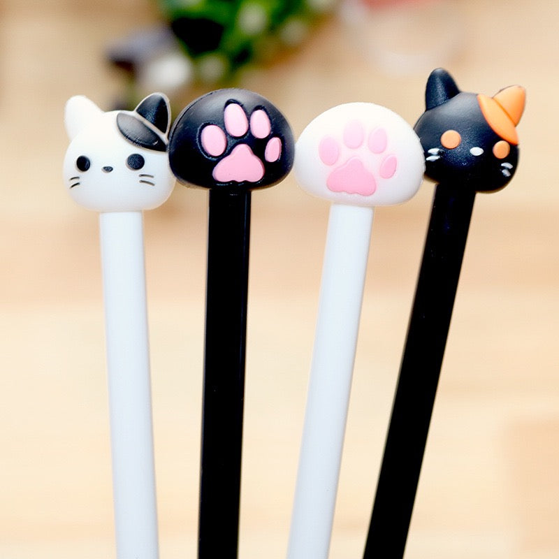 PAWSOME PEN #4 featuring a cute cat paw design in blue and black colors, perfect for journaling and note-taking.