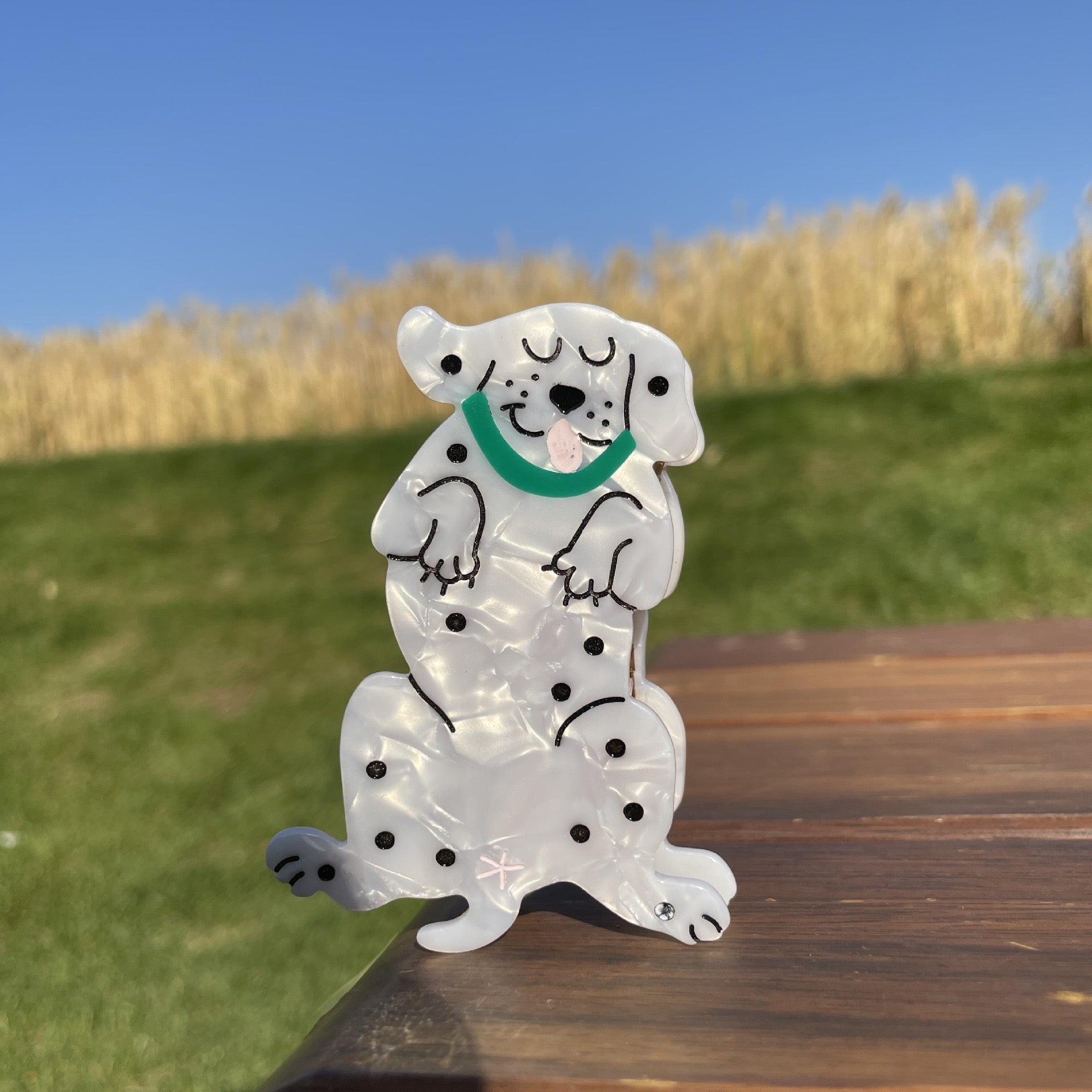 Hand-painted Pug design claw hair clip made from eco-friendly cellulose acetate.
