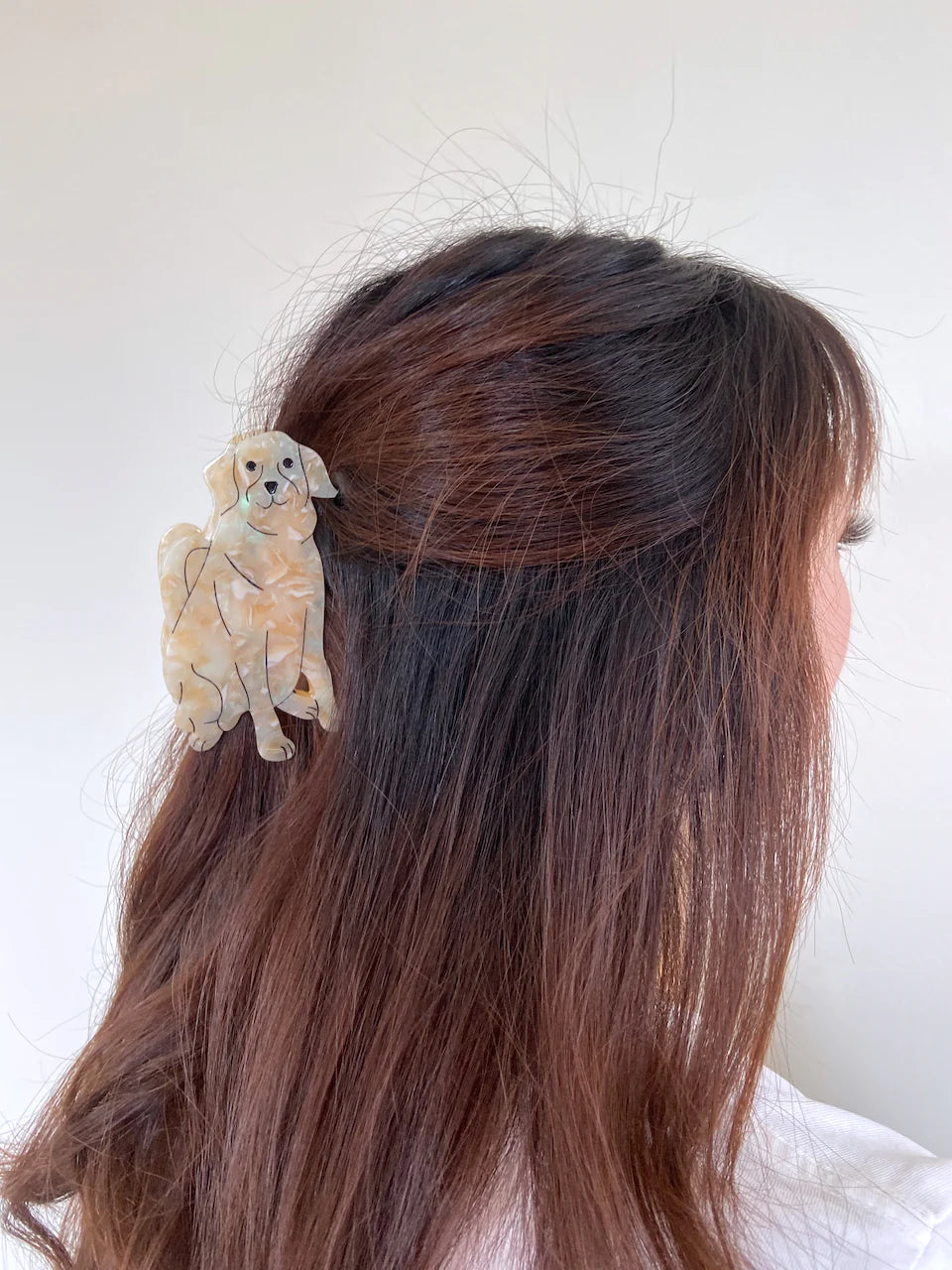 Hand-painted Pug design claw hair clip made from eco-friendly cellulose acetate.