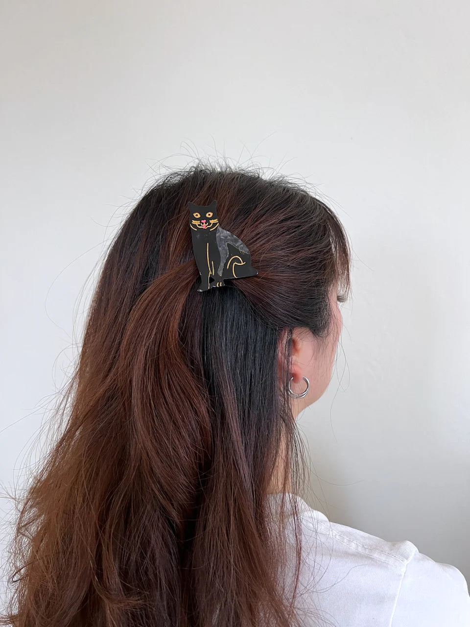 Hand-painted Pug design claw hair clip made from eco-friendly cellulose acetate.