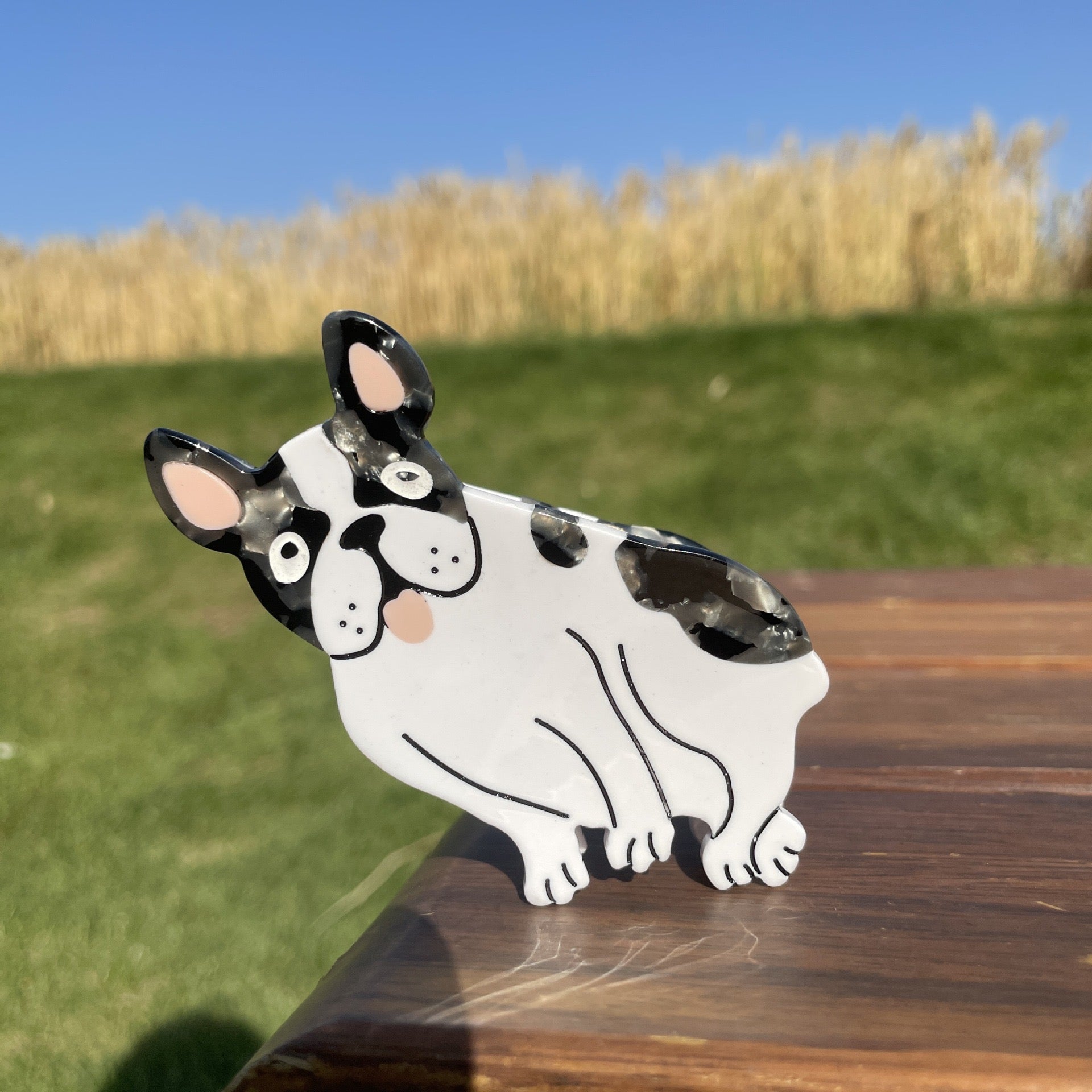 Hand-painted Pug breed claw hair clip by Pawsome Pets New York, showcasing vibrant colors and eco-friendly design.