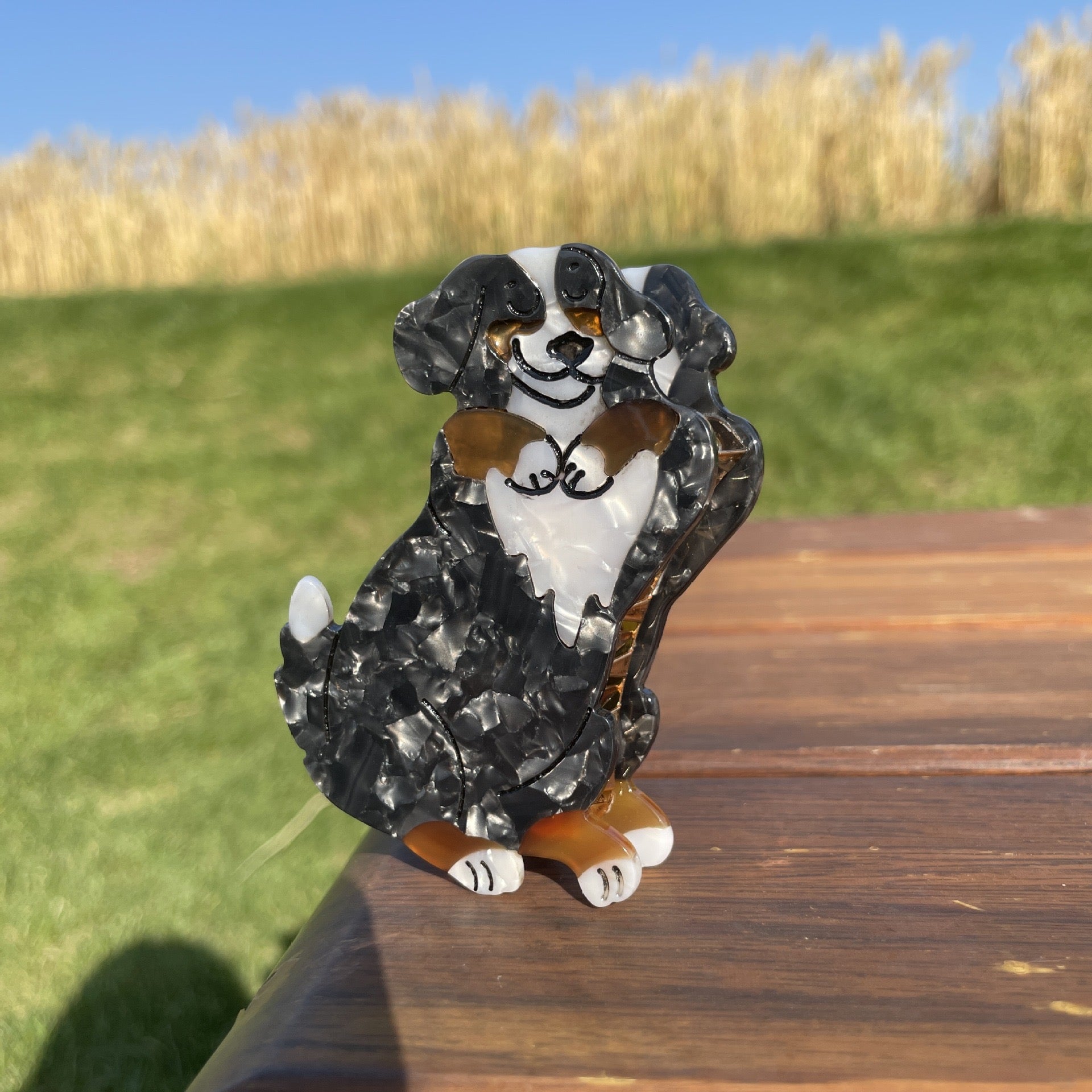 Hand-painted Pug breed claw hair clip by Pawsome Pets New York, showcasing vibrant colors and eco-friendly design.