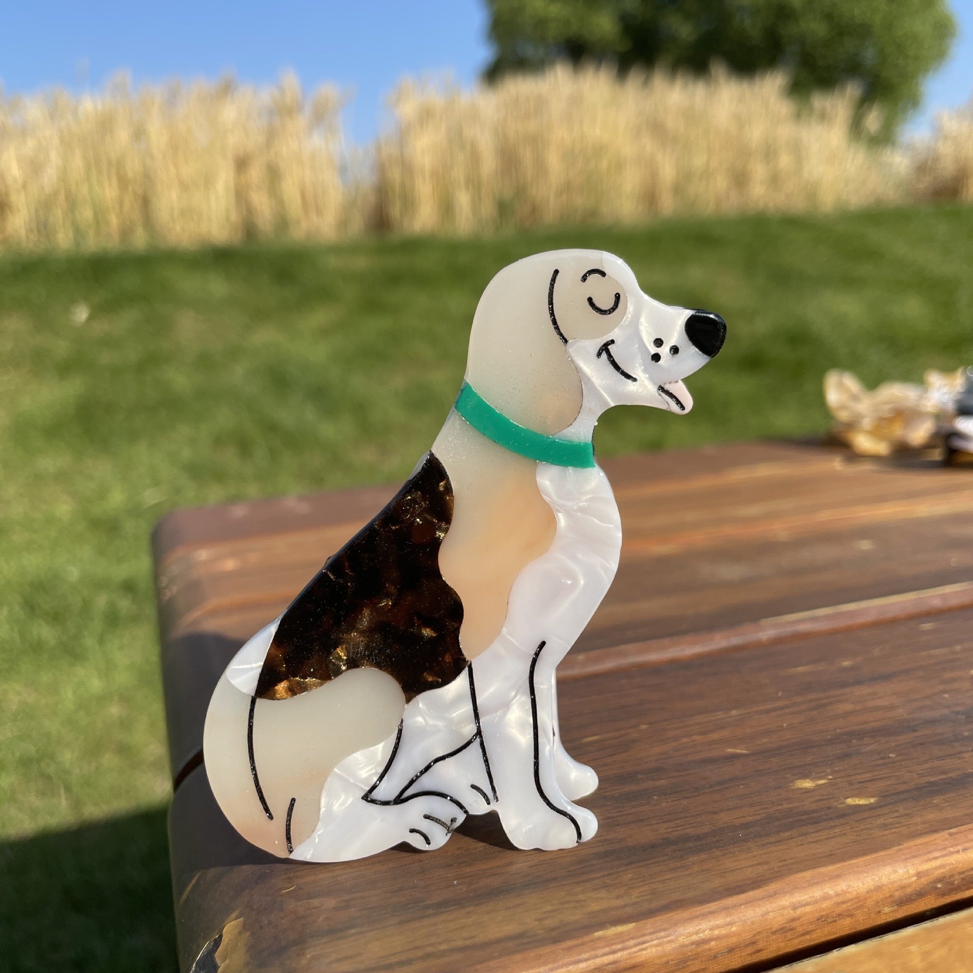 Hand-painted Pug design claw hair clip made from eco-friendly cellulose acetate.