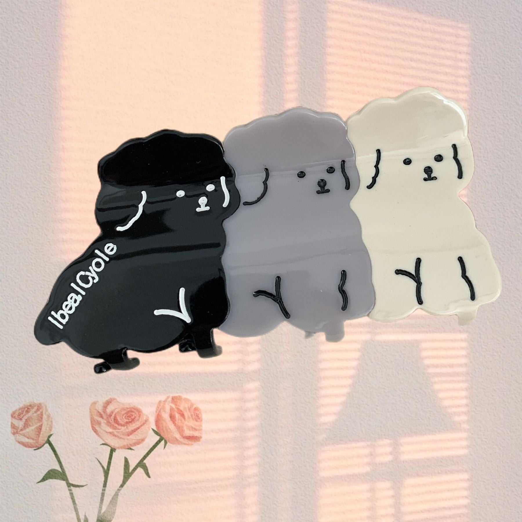 Hand-painted Pug breed claw hair clip by Pawsome Pets New York, showcasing vibrant colors and eco-friendly design.