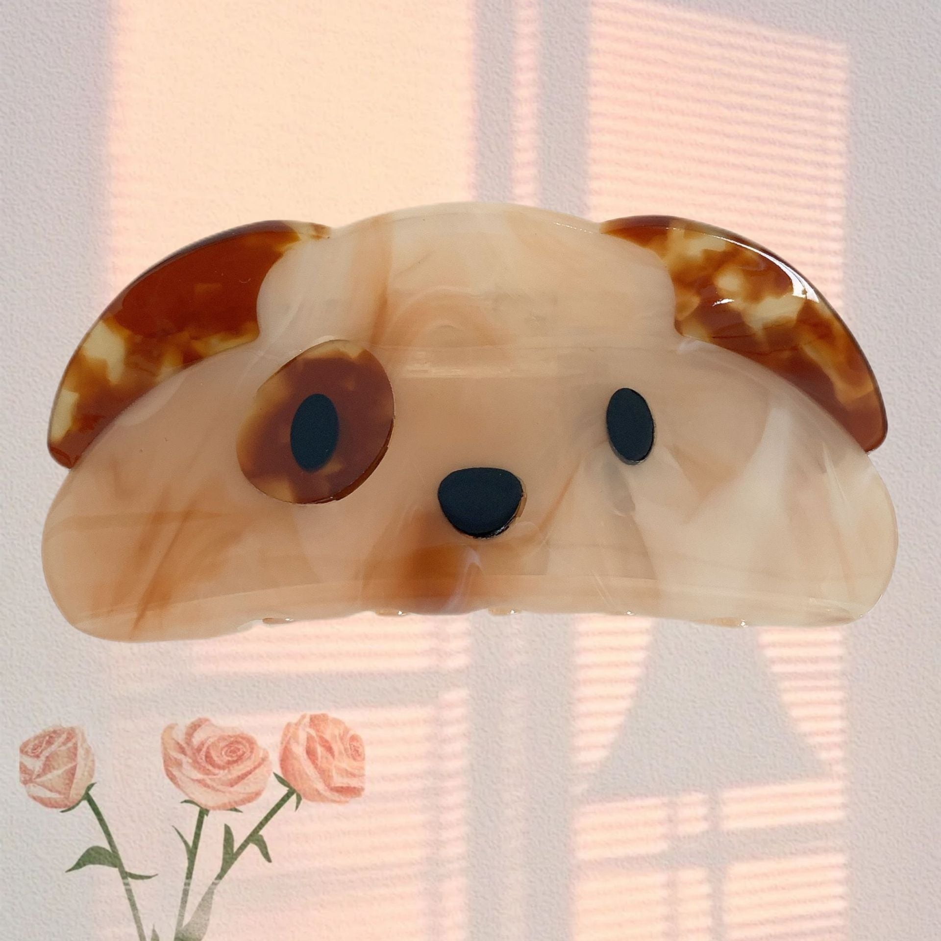 Hand-painted Pug design claw hair clip by Pawsome Pets New York, made from eco-friendly cellulose acetate.