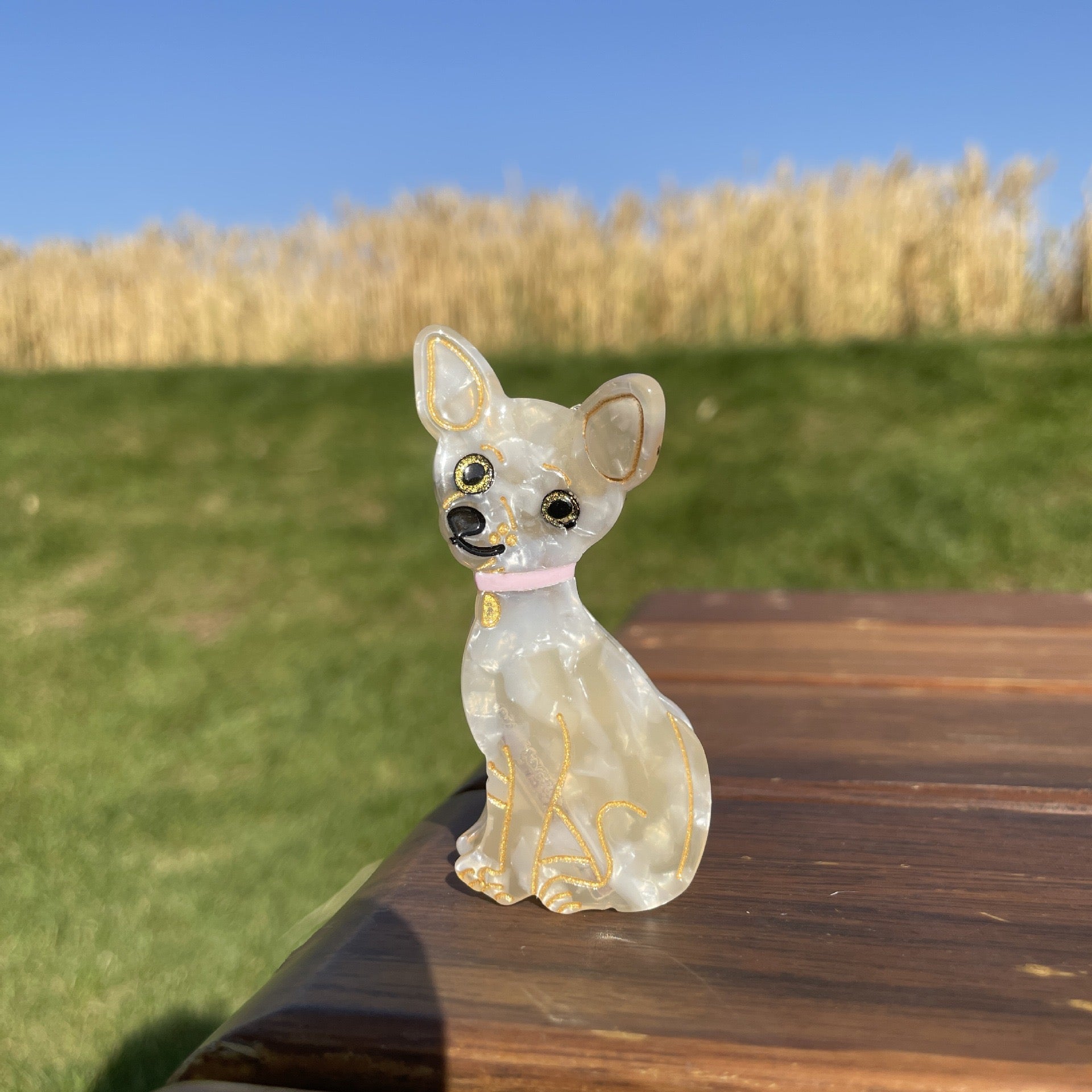 Hand-painted Pug design claw hair clip made from eco-friendly cellulose acetate, showcasing a unique and stylish accessory for dog lovers.