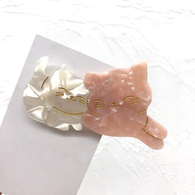 Hand-painted Friendship Cat Hair Clip featuring rhinestones, made from eco-friendly cellulose acetate.