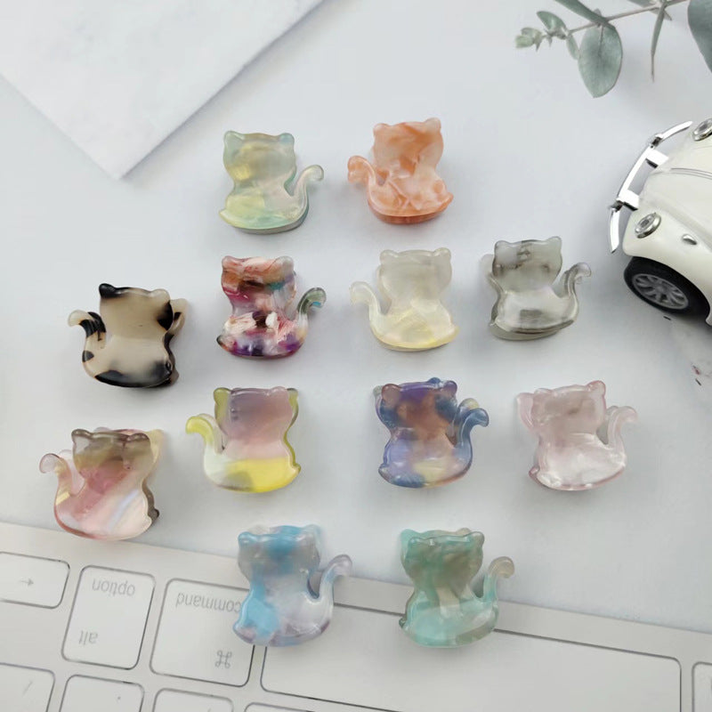 Hand-painted standing cat hair clip with rhinestones, made from eco-friendly cellulose acetate, perfect for cat lovers.