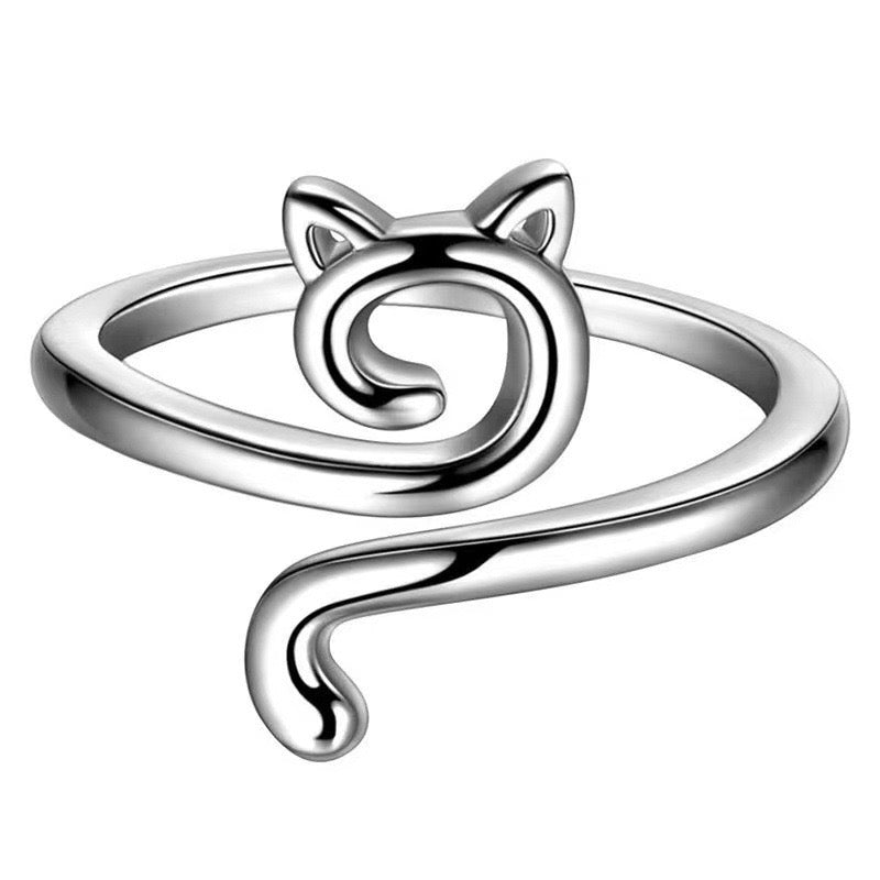 Adjustable sterling silver ring featuring cat ears and paw design, perfect for pet lovers.
