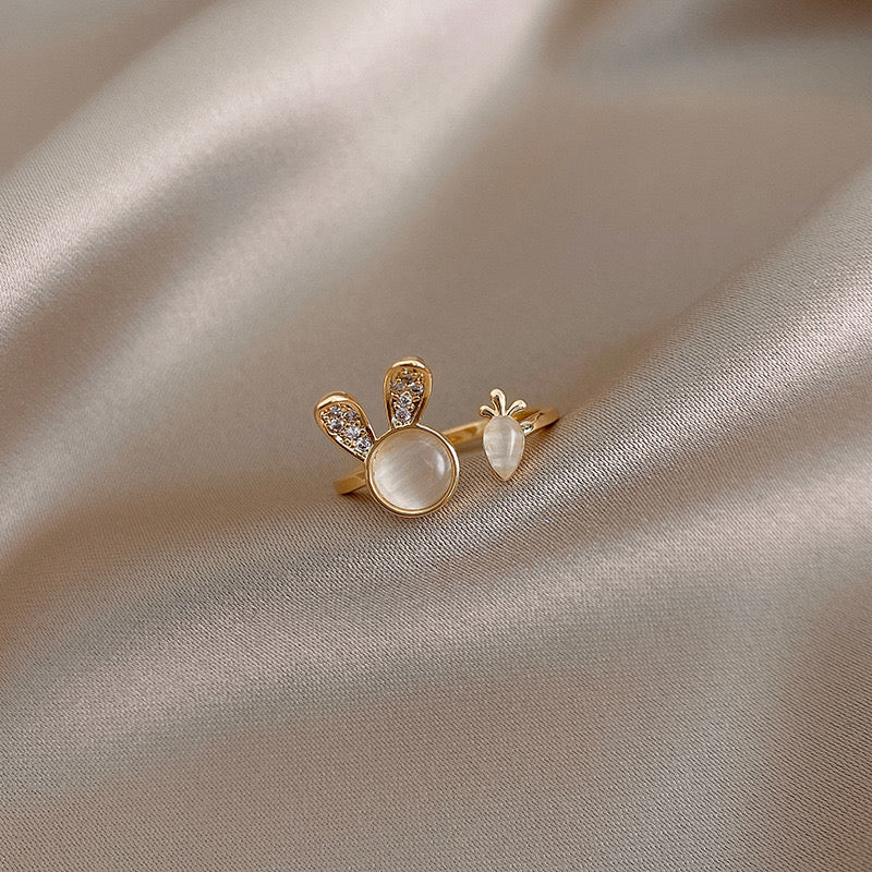 Adjustable sterling silver ring featuring cat ears and paw design, perfect for pet lovers.