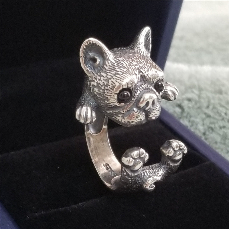 Adjustable sterling silver ring featuring cat ears and paw design, perfect for pet lovers.